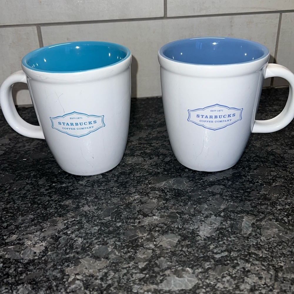 2-13oz Starbucks 2006 white and blue coffee mugs. In excellent condition.